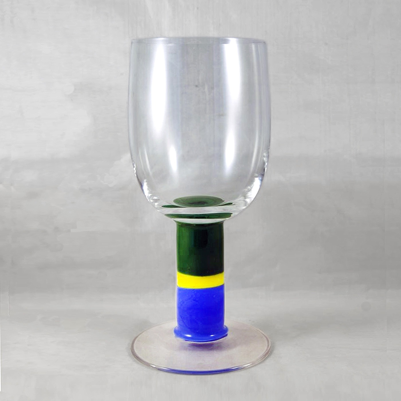 "Hälsingborg" Ett enklare Popglas med klar kupa och fot samt sprängd kant, tillverkades på Sandviks Glasbruk.